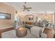Spacious living room with sectional sofa, adjacent dining area and passthrough to kitchen at 1720 Fruitridge St, Brandon, FL 33510
