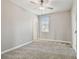 Bedroom featuring neutral walls, plush carpeting, and a ceiling fan at 17589 Cruiser Bnd, Land O Lakes, FL 34638