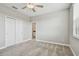 Bedroom features carpet, ceiling fan, closet and easy access to en suite bathroom at 17589 Cruiser Bnd, Land O Lakes, FL 34638
