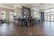 Stylish cafe bar with barstool seating and mounted TVs above at 17589 Cruiser Bnd, Land O Lakes, FL 34638