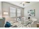 Inviting office space with a glass desk, comfortable seating, and natural light creates a productive environment at 17589 Cruiser Bnd, Land O Lakes, FL 34638