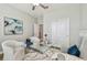 Bright office featuring modern decor, a glass desk, and comfortable seating for an inspiring workspace at 17589 Cruiser Bnd, Land O Lakes, FL 34638