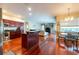 Open kitchen overlooking the Gathering room; beautiful hardwood floors and stainless steel appliances at 18518 Bittern Ave, Lutz, FL 33558