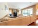 Spacious living area with hardwood floors, neutral decor, and large sliding glass doors at 18518 Bittern Ave, Lutz, FL 33558