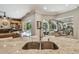 Bright, modern kitchen featuring granite countertops and stainless steel fixtures at 1877 Muirfield Way, Oldsmar, FL 34677