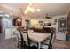 Open concept dining area adjacent to the kitchen and living room, great for entertaining at 2121 Worthington Greens Dr, Sun City Center, FL 33573