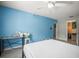 Bedroom with a bed, desk, and closet at 2174 62Nd N St, Clearwater, FL 33760