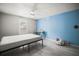 Bedroom with a bed, window, and bags on the floor at 2174 62Nd N St, Clearwater, FL 33760