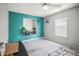 Bedroom with a turquoise wall and display nook at 2174 62Nd N St, Clearwater, FL 33760