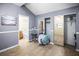 Bedroom featuring an ensuite bathroom, and a closet with mirrored doors at 2174 62Nd N St, Clearwater, FL 33760