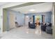 Inviting living room with blue walls, tile floors and comfortable seating area at 2174 62Nd N St, Clearwater, FL 33760