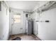 Storage room with a water heater at 2174 62Nd N St, Clearwater, FL 33760