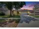 Beautifully landscaped home with a spacious driveway, perfect for a Gathering at 2527 Wrencrest Cir, Valrico, FL 33594