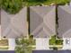 Aerial view of the home's roof, driveway, and landscaping, nestled among well-maintained yards at 31201 Shaker Cir, Wesley Chapel, FL 33543
