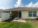Screened-in patio and open backyard offers a seamless transition to outdoor living and entertaining at 31201 Shaker Cir, Wesley Chapel, FL 33543
