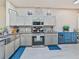 Bright and spacious kitchen with stainless steel appliances, granite countertops, and mosaic tile backsplash at 31201 Shaker Cir, Wesley Chapel, FL 33543