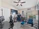 Office with vaulted ceiling, ceiling fan, desk and comfortable seating at 31201 Shaker Cir, Wesley Chapel, FL 33543