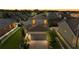 Charming two-story home boasts a well-manicured lawn and attached two-car garage in a neatly organized residential area at 32718 Harmony Oaks Dr, Wesley Chapel, FL 33545