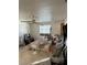 A bedroom featuring a bed and minimal furnishings in an uninhabitable condition at 3311 W Saint Conrad St, Tampa, FL 33607