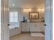 Modern bathroom featuring a soaking tub, stylish fixtures, and wood-look tile flooring at 3322 Cypress Landing Dr, Valrico, FL 33596