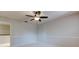 A light, bright, and airy bedroom with plush carpeting and neutral walls. There is a ceiling fan at 3322 Cypress Landing Dr, Valrico, FL 33596