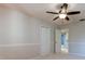 This bedroom offers neutral walls, carpet, and a double closet with easy access to other rooms in the house at 3322 Cypress Landing Dr, Valrico, FL 33596