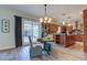 Cozy dining area with a charming table, seating, and a view to the modern kitchen at 3322 Cypress Landing Dr, Valrico, FL 33596
