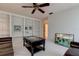Bright living room featuring custom built-in shelving and a unique center table at 3322 Cypress Landing Dr, Valrico, FL 33596