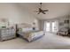 Spacious bedroom featuring neutral tones, ample natural light, and a walk-out balcony at 3322 Cypress Landing Dr, Valrico, FL 33596