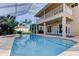 Beautiful screened-in pool with lanai offers ample outdoor living space at 3322 Cypress Landing Dr, Valrico, FL 33596