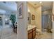 Hall view of bathroom and breakfast nook at 347 Cockle Shell Loop, Apollo Beach, FL 33572