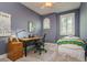 Multi-purpose bedroom with desk, day bed, ceiling fan, and lots of light at 3714 W San Juan St, Tampa, FL 33629
