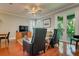 Comfortable living room featuring hardwood floors, an area rug, and neutral paint at 3714 W San Juan St, Tampa, FL 33629