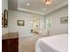 Spacious main bedroom featuring a tray ceiling and an attached ensuite bathroom at 3714 W San Juan St, Tampa, FL 33629