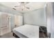 This bedroom boasts a light-filled closet with shelving to complement the room's serene ambiance at 4221 W Spruce St # 2104, Tampa, FL 33607