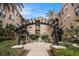 A beautiful courtyard with a fountain and lush landscape provides residents an inviting outdoor oasis at 4221 W Spruce St # 2104, Tampa, FL 33607