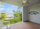 Outdoor balcony with views of green lawn at 4325 58Th N Way # 1527, Kenneth City, FL 33709