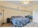 Cozy bedroom featuring sliding mirrored closet doors, a ceiling fan and lots of natural light at 4325 58Th N Way # 1527, Kenneth City, FL 33709