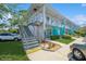 Charming two-story condominium building featuring easy access stairs and colorful accents at 4325 58Th N Way # 1527, Kenneth City, FL 33709