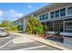 Well-maintained condominium building with lush landscaping and ample parking for residents and guests at 4325 58Th N Way # 1527, Kenneth City, FL 33709