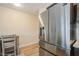 Kitchen featuring stainless steel refrigerator and hardwood floors, blending convenience with modern aesthetics at 4325 58Th N Way # 1527, Kenneth City, FL 33709