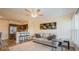 Inviting living area features modern decor and a view into the well-equipped kitchen, perfect for entertaining at 4325 58Th N Way # 1527, Kenneth City, FL 33709
