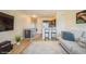 Inviting living room boasts hardwood floors, stylish decor, and comfortable seating for relaxing and entertaining at 4325 58Th N Way # 1527, Kenneth City, FL 33709