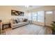 Comfortable living room with lots of natural light, a modern rug, and stylish decor invites relaxation at 4325 58Th N Way # 1527, Kenneth City, FL 33709