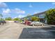 Full parking lot located next to a residential building, offering convenient parking for residents and visitors at 4325 58Th N Way # 1527, Kenneth City, FL 33709