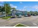 Spacious parking lot serving a residential building with plenty of space for residents and visitors at 4325 58Th N Way # 1527, Kenneth City, FL 33709