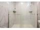 Tiled shower features a sliding glass door and modern fixtures at 4325 58Th N Way # 1527, Kenneth City, FL 33709