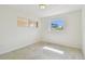 Bright bedroom with two windows providing ample natural light and fresh air at 4400 Helena Ne St, St Petersburg, FL 33703