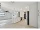 Large updated kitchen with island, stainless appliances, and bright lighting at 4400 Helena Ne St, St Petersburg, FL 33703