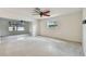 Open-concept living area with large windows for plenty of natural light at 4400 Helena Ne St, St Petersburg, FL 33703